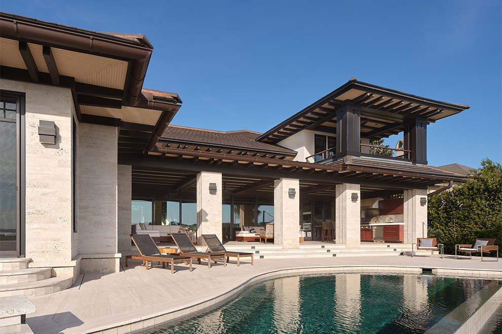 Modern coastal residence with pool and outdoor living spaces designed through intentional residential architecture.